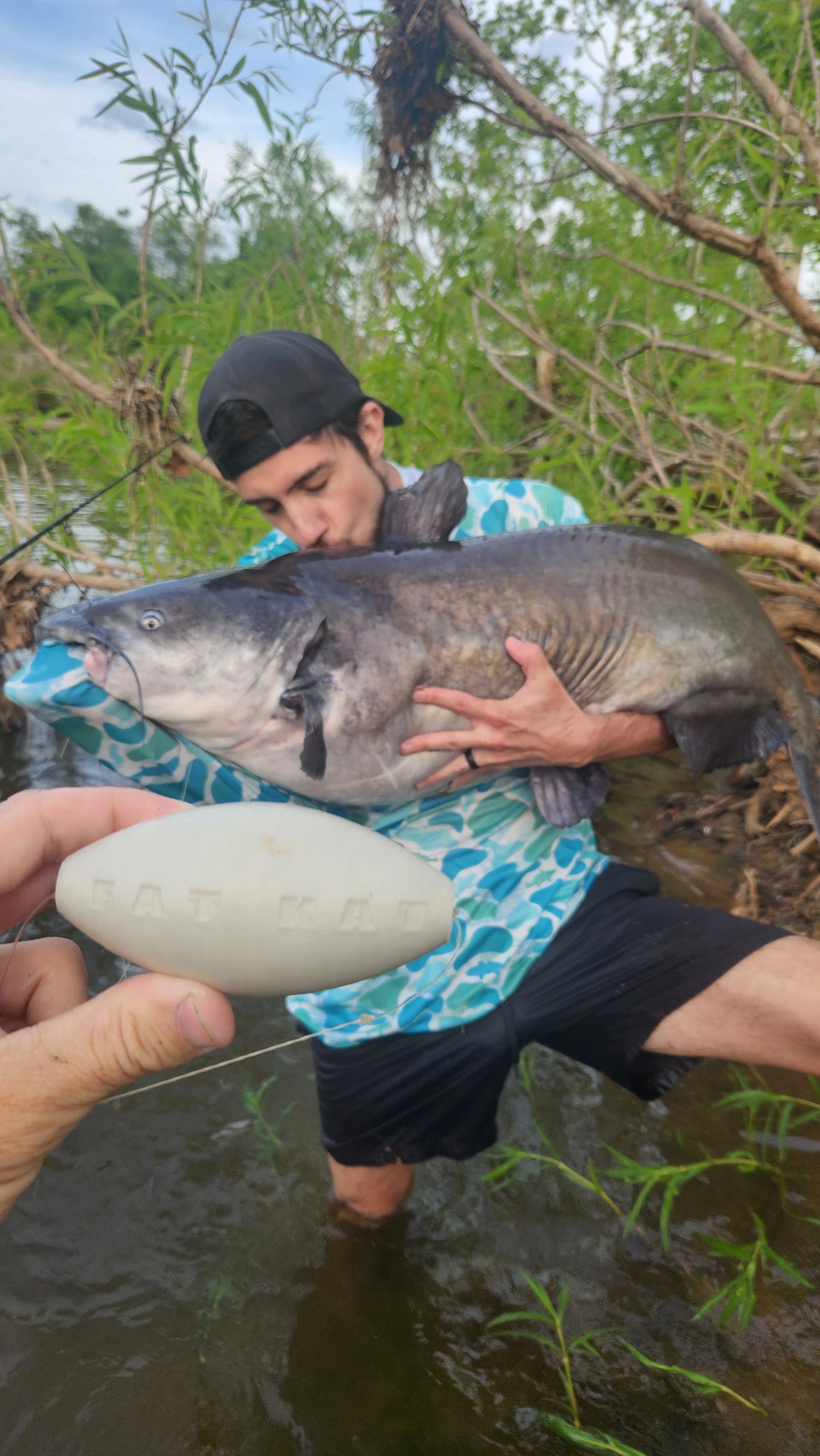 Field Test success.  Angler holds a citation blue catfish pulled in from the Jame River in Richmond, Virginia