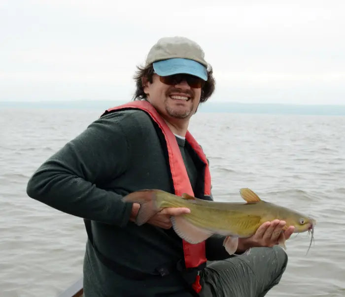 Channel catfish caught in a pond using a bobber rig with suspended bait.